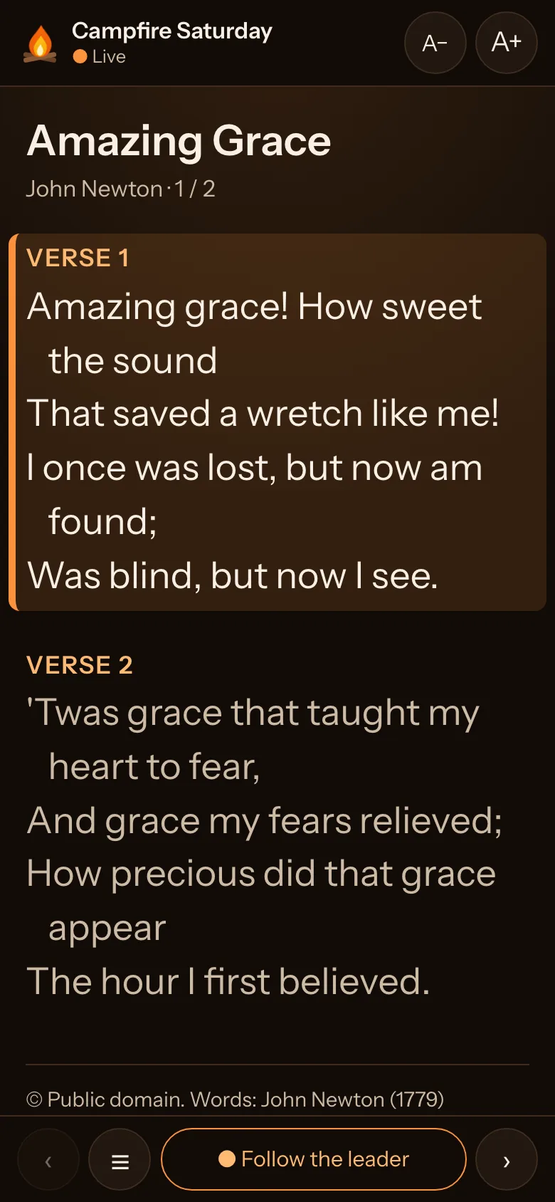 A phone showing the words of Amazing Grace, with the verse being sung highlighted
